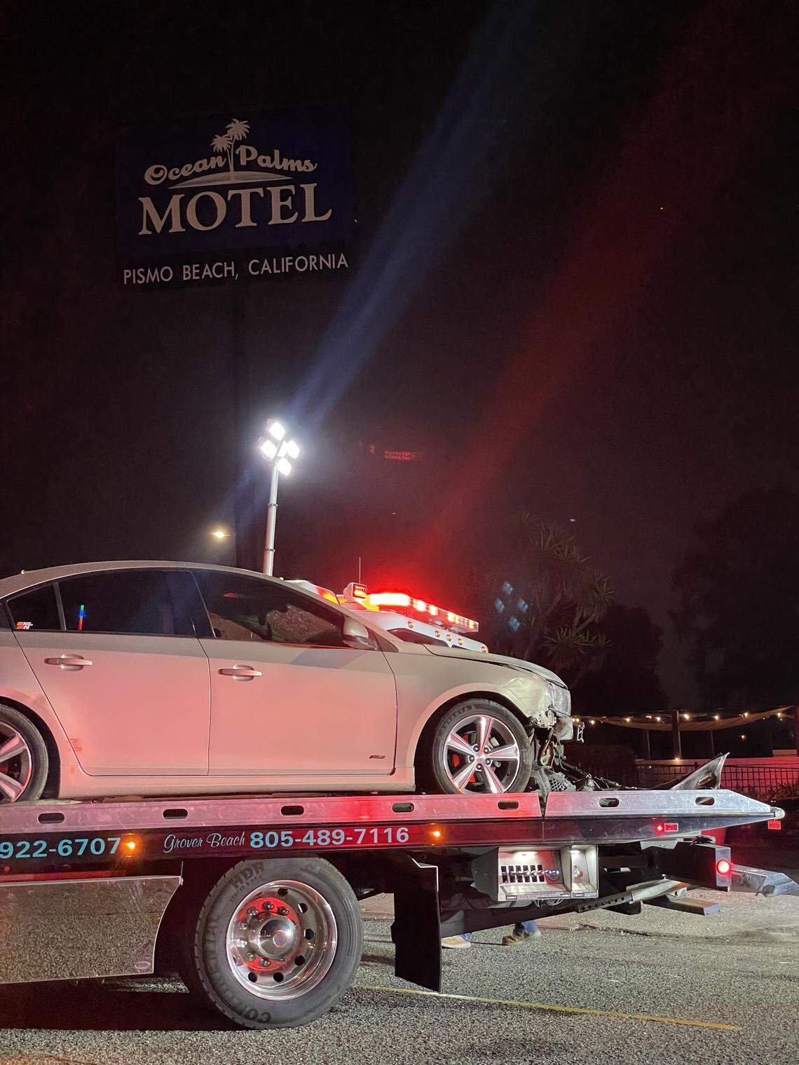 A car crashed into the Ocean Palms Motel in Pismo Beach on Sept. 24, 2025, injuring three people. The building was declared unstable and crews were working to clear the area.