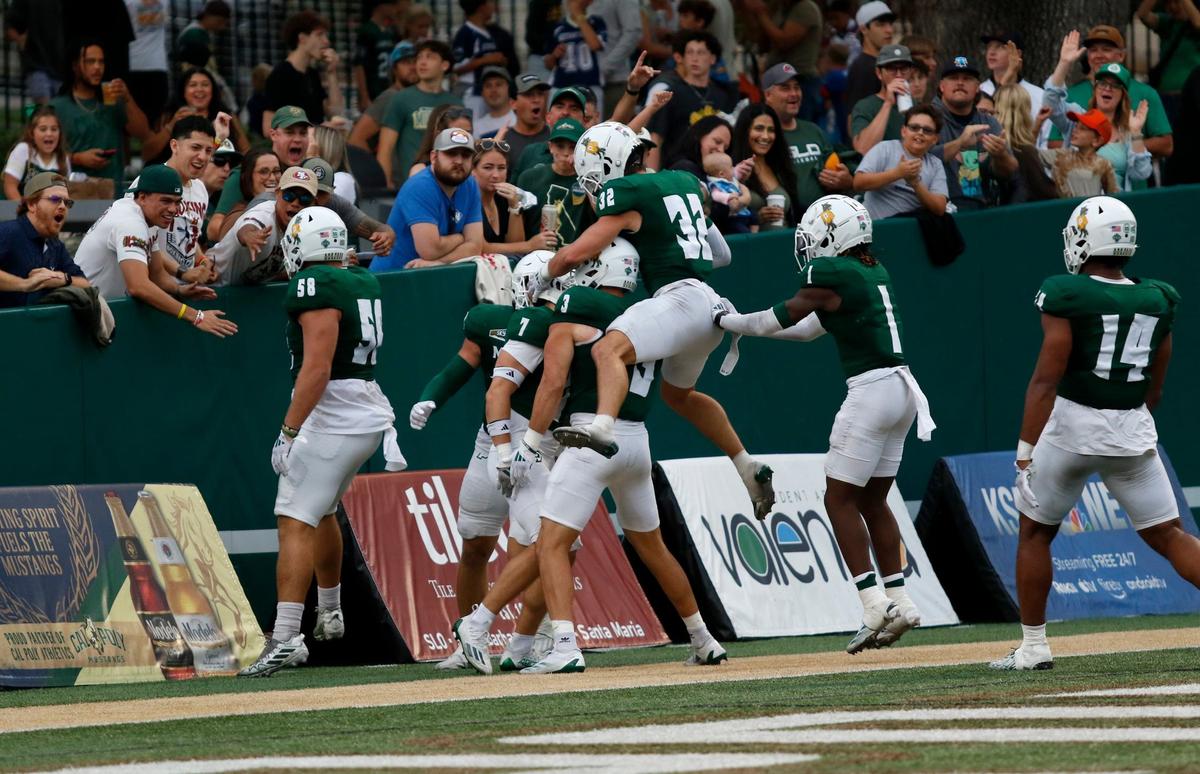 Cal Poly celebrates a touchdown. Cal Poly lost to Idaho State 41-38 in a college football game at Mustang Memorial Stadium on Oct. 5, 2024