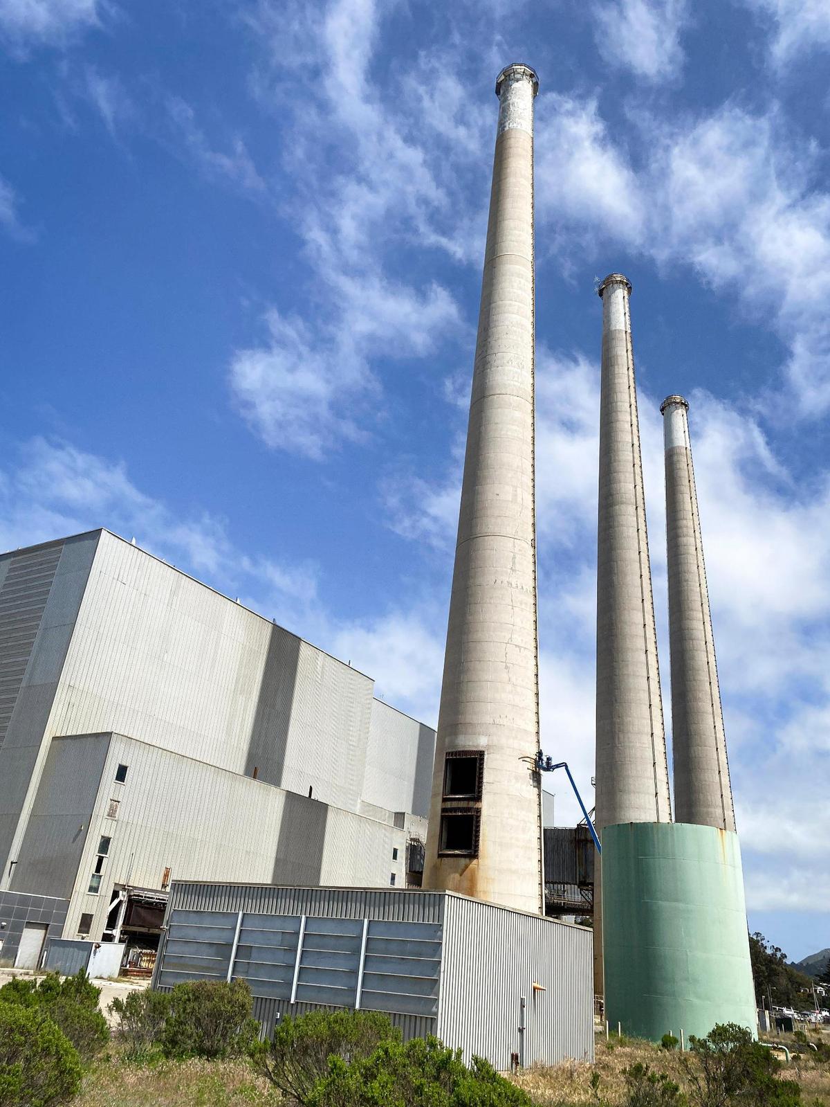 A construction crew performed routine maintenance on a 450-foot-tall Morro Bay Power Plant smoke stack on April 23, 2025. This was the first of three stacks that were built on the site and dedicated July 7, 1955, almost 70 years ago.