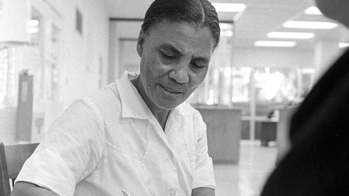 Dora Baines, San Luis Obispo, registers to vote Feb. 1965 in the San Luis Obispo County clerk’s office, a big moment in her life after being denied this right for more than 35 years in Mississippi.
