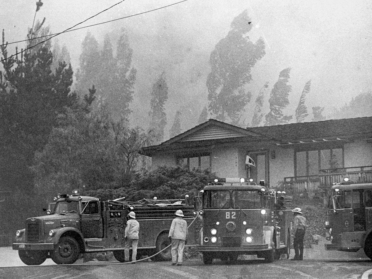 Smoke and high winds faced firefighters in the Flora Street neighborhood of San Luis Obispo during the height of the fire July 8, 1985. Las Pilitas Fire began July 1, 1985. The nine-day fire consumed 75,000 acres of brush, 10 homes, cost $6.3 million and jumped fire lines twice.