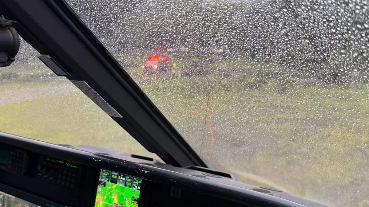 The cockpit view from the H-70 helicopter on scene of the hiker rescue.