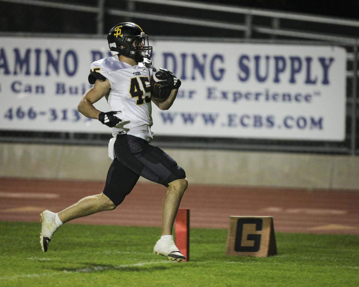 Colbin Garrison scores a touchdown for the Tigers. San Luis Obispo beat Atascadero 28-14 in high school football on Oct. 31, 2025.