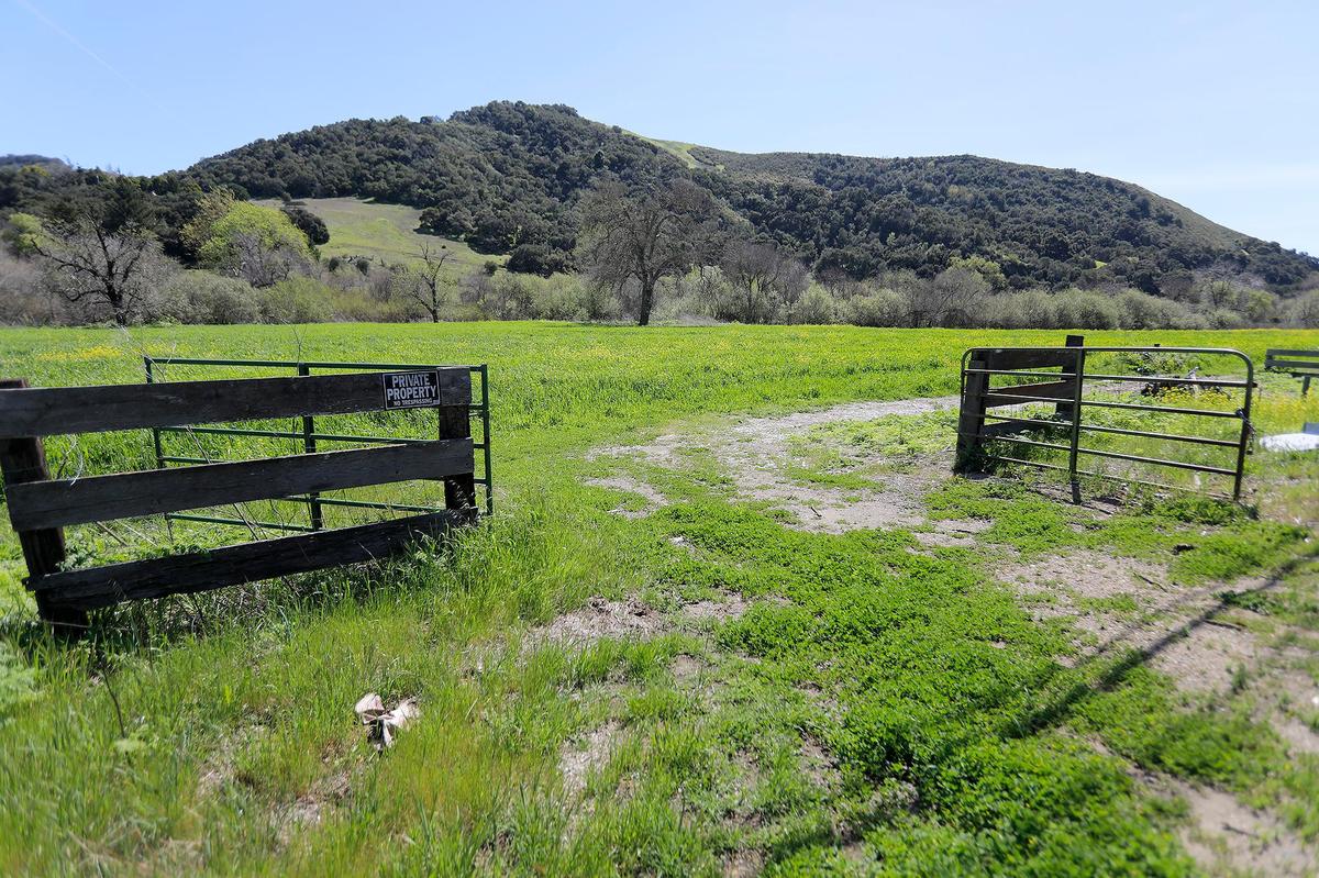Funding, property disputes, and redesign hurdles facing the Bob Jones Trail extension. This is a view of Clover Ridge Lane south of Venado Trail.