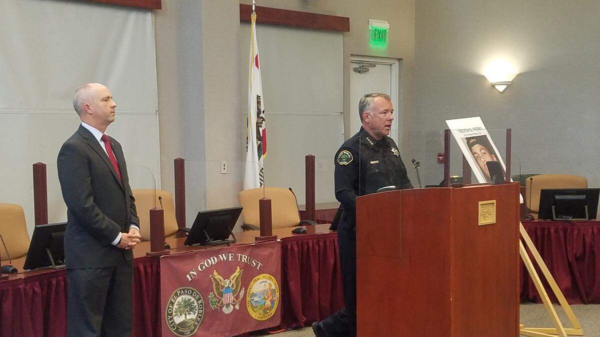 Paso Robles Police Chief Ty Lewis speaks at a news conference Friday, June 26, 2020, announcing that human remains believed to be Trevon Perry were found at a home in Riverside. Listening at left is District Attorney Dan Dow.