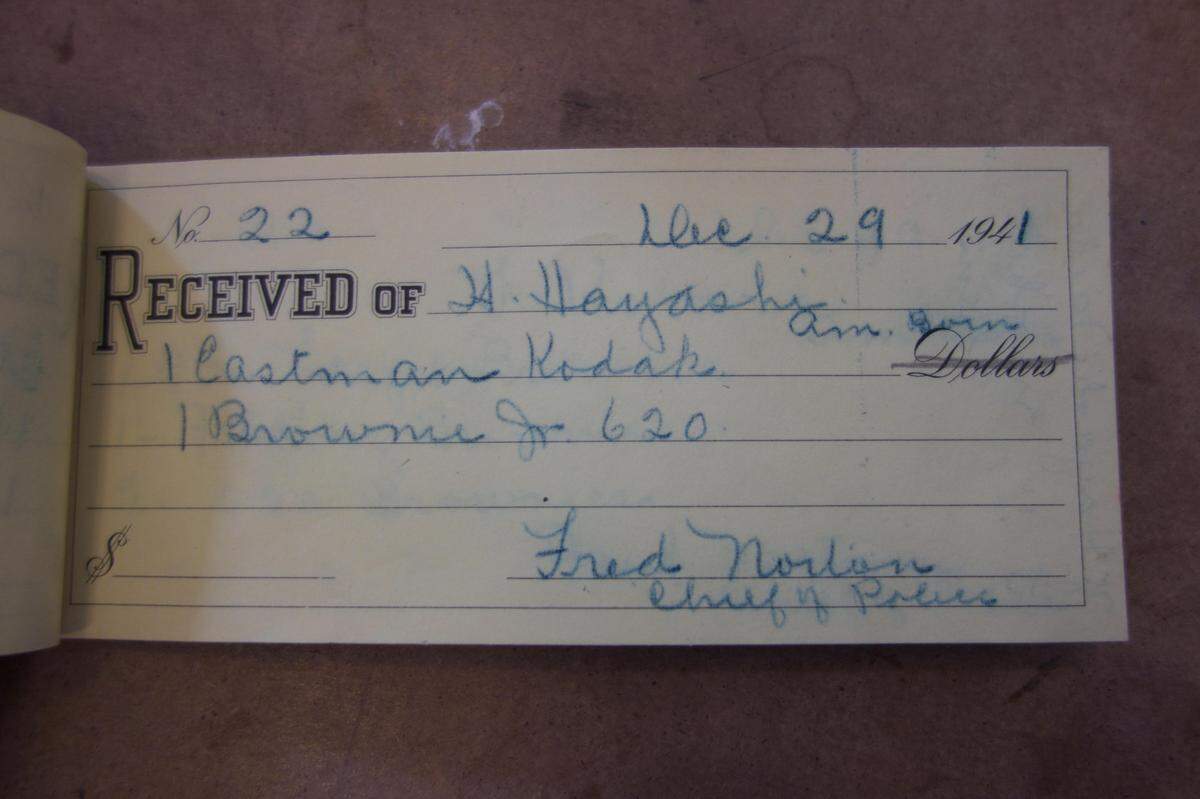 Copy of ledger page documenting cameras confiscated from Hayashi family.