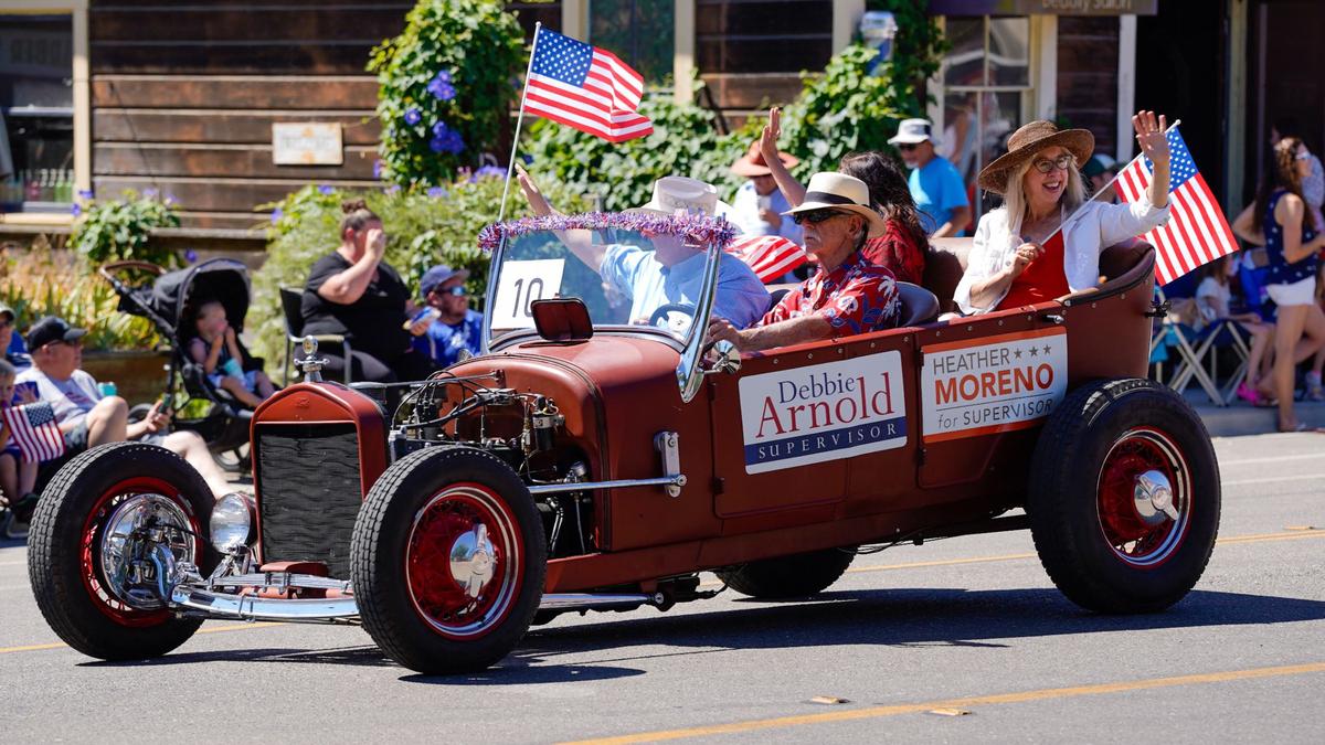San Luis Obispo County District 5 Supervisor Debbie Arnold and Atascadero Mayor Heather Moreno ride in the Templeton Fourth of July Parade Thursday, July 4, 2024. The parade featured dozens of floats and acts, including classic cars, marching bands and appearances by local law enforcement and fire services.