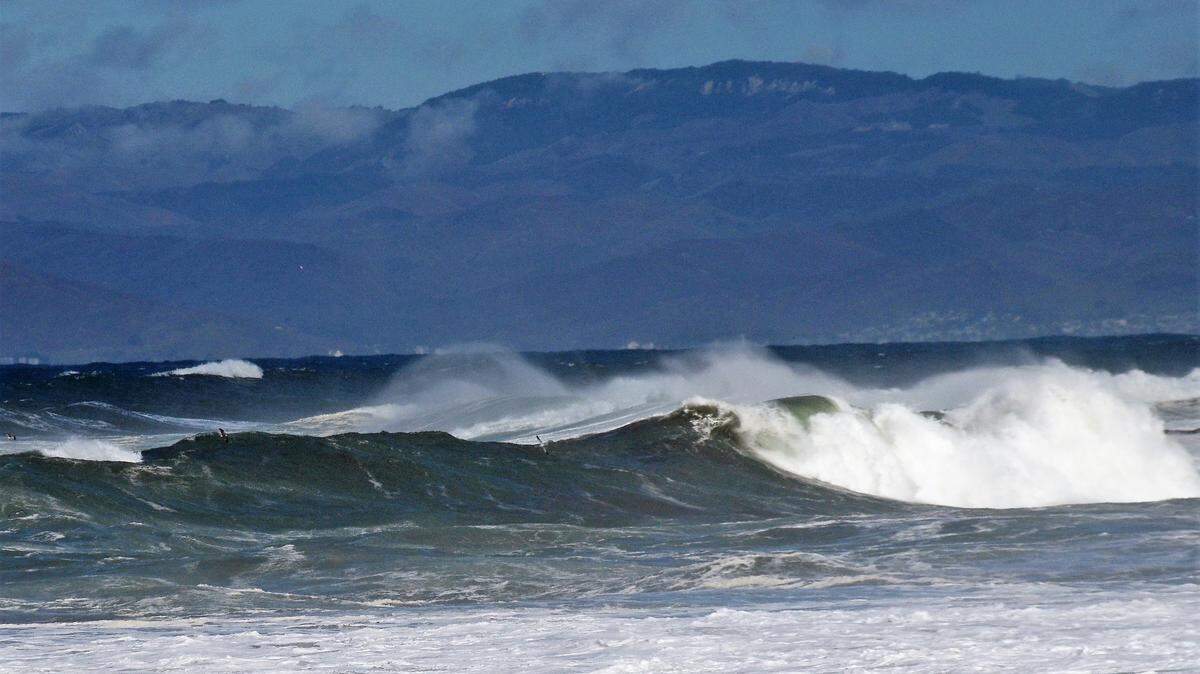 Waves crash along the Cayucos shoreline.