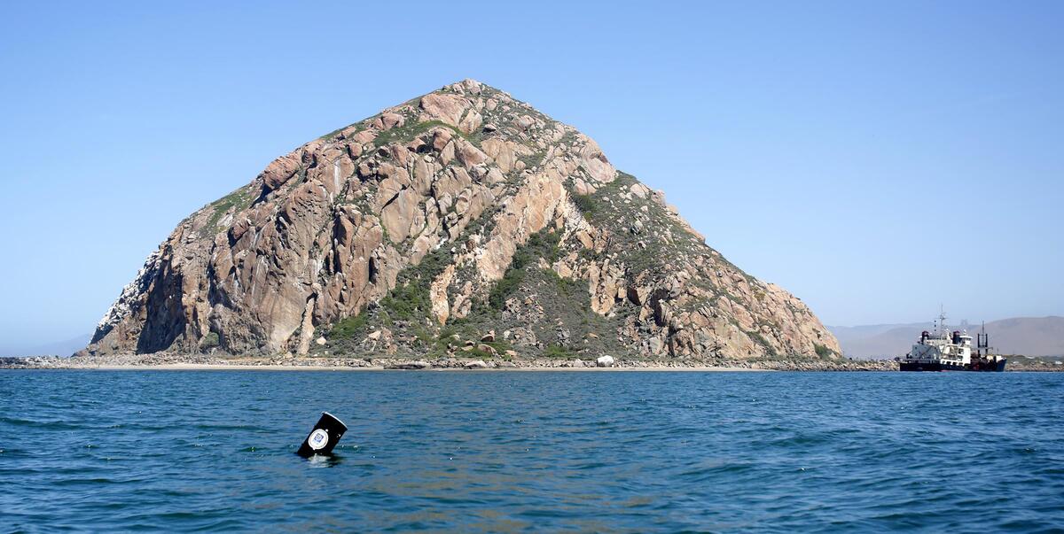 Cal Poly students took to the seas May 22, 2025, to test a prototype for a device aimed at harnessing the energy of waves to charge batteries. The Expeditionary Ocean Power Generator floats in front of Morro Rock.