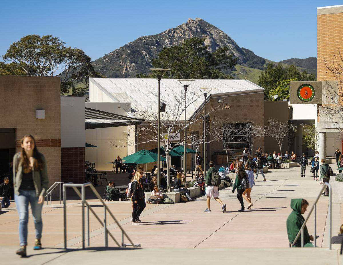 Cal Poly students walk through the university union on campus in San Luis Obispo, California.