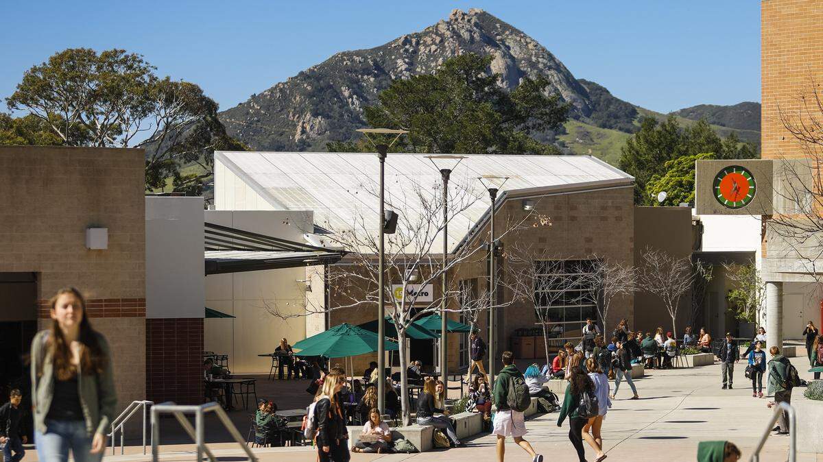 Cal Poly students walk through the university union on campus in San Luis Obispo, California.