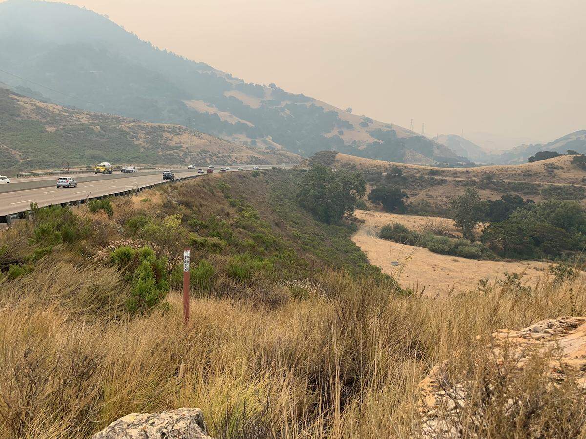 Smoky skies obscure the view of this hills on the Cuesta Grade on Wednesday morning.