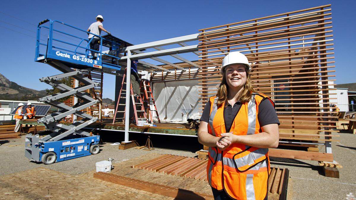 Cal Poly Solar Decathlon House co-project manager Lisa-Marie Mueller talks about the features of the house which be traveling to Irvine in October for the international 2015 Solar Decathlon competition. 
Photo by Joe Johnston 09-08-15