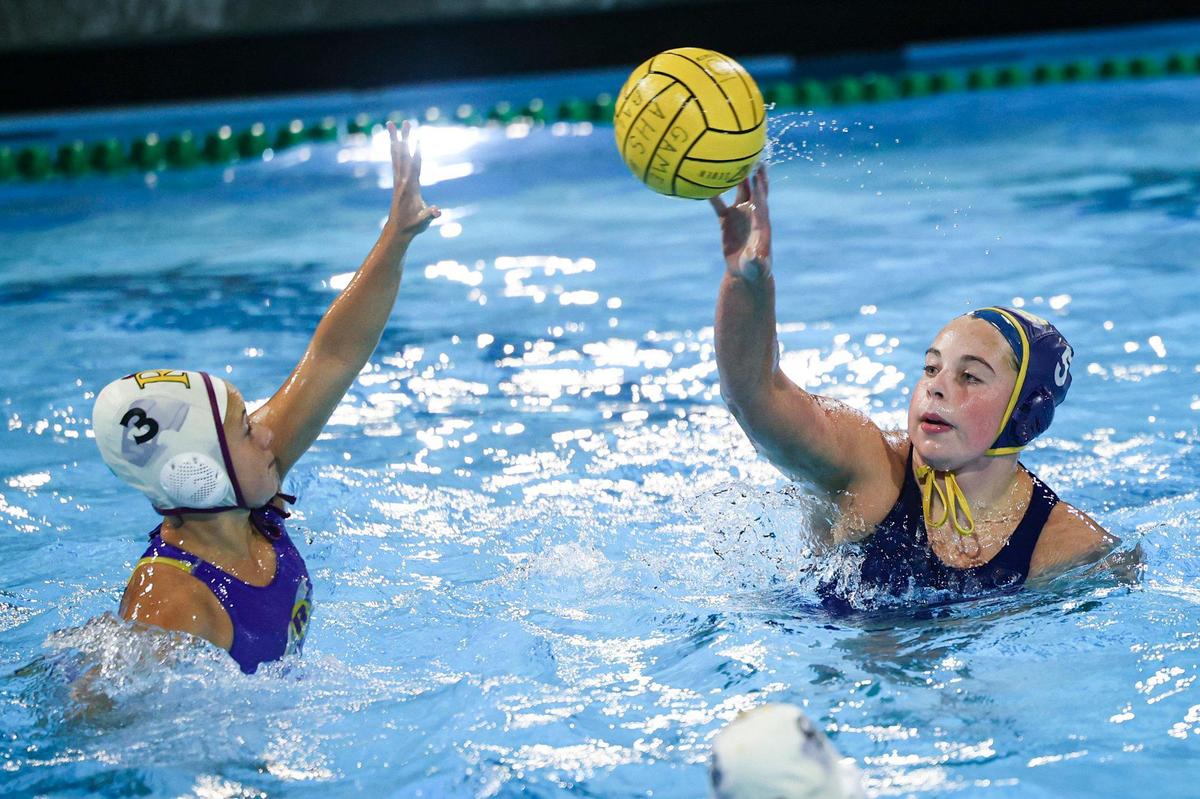 Berkley Sinner takes a floating shot as Arroyo Grande girls water polo beat Righetti 11-5 on Oct. 30, 2024, to win another Mountain League title.