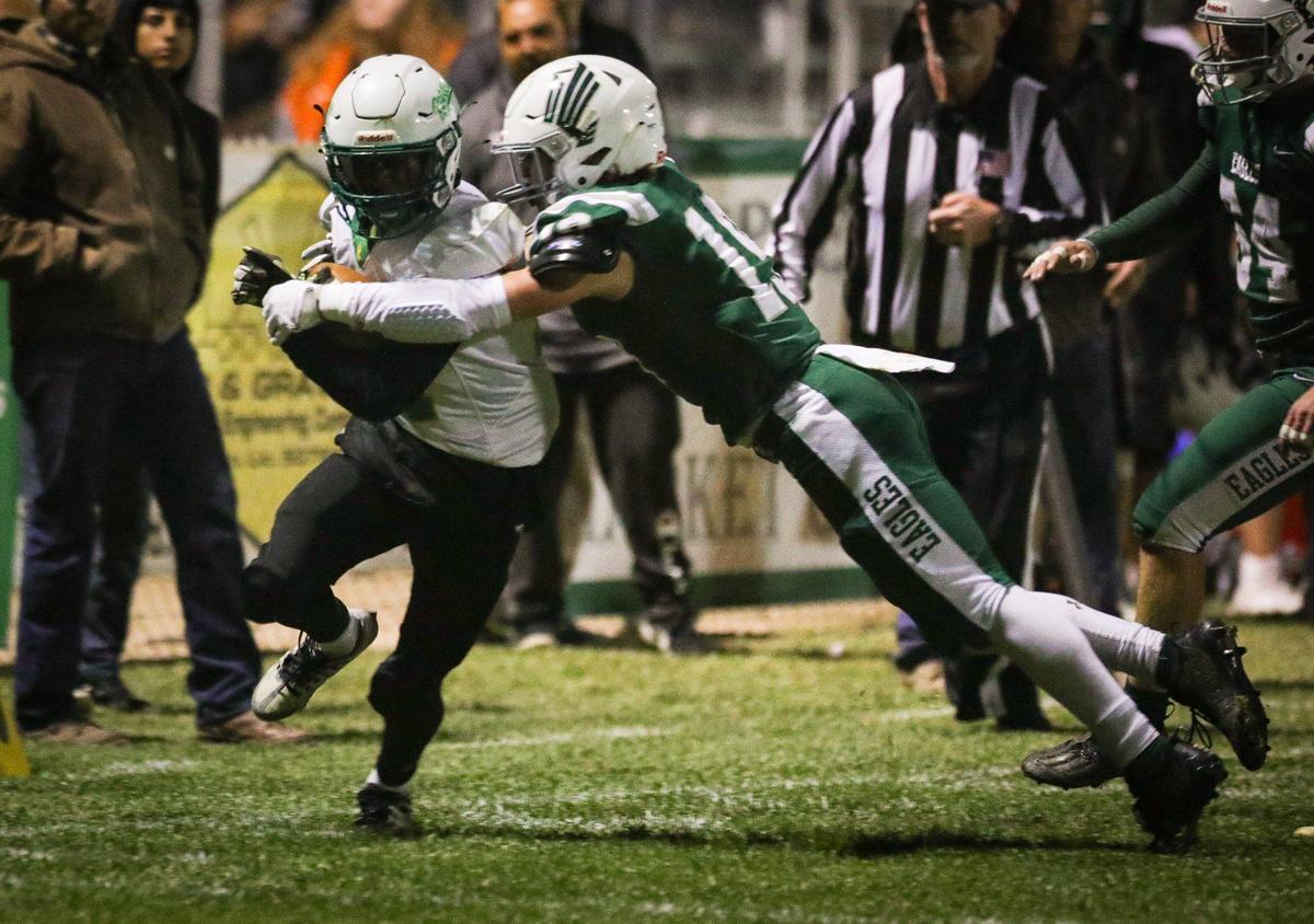 Daxton Calagna makes a tackle for the Eagles. Templeton beat Roosevelt 27-14 on Nov. 4, 2022, in a first-round playoff football game.