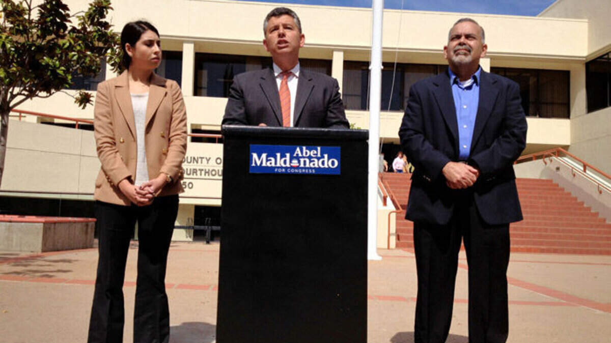 Former Lt. Gov. Abel Maldonado is flanked by daughter Erika and Dr. Rene Bravo in front of the San Luis Obispo County Courthouse on Friday.