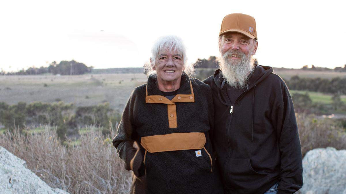 Kim Adams, at left, and her husband Thomas Adams, pose for a picture on Dec. 9, 2022. Kim Adams, who was diagnosed with large cell lymphoma, is home in Cambria after a month of shuttling between hospitals.