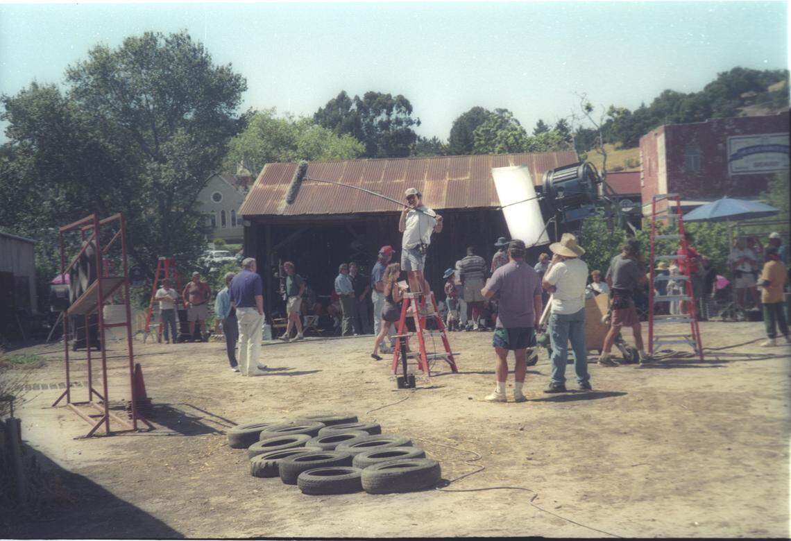 Rick Moranis and John Madden rehearse at left on the set of the movie “Little Giants” in Arroyo Grande. The story follows a Pee Wee football team in Ohio.