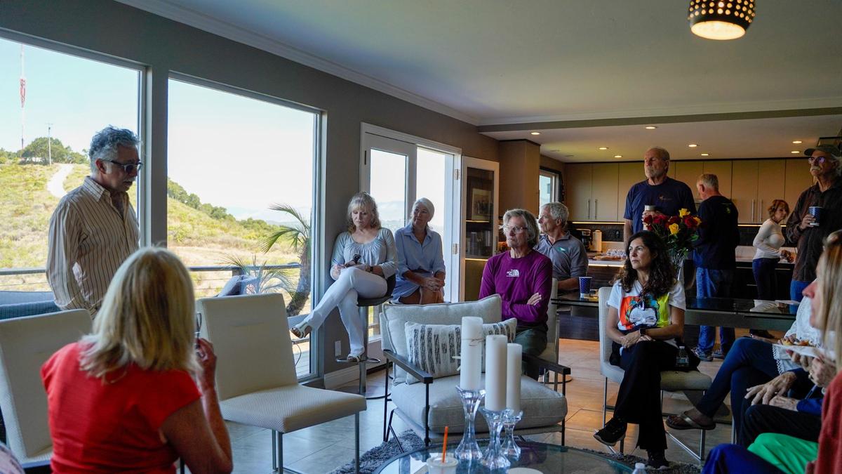 A collection of residents of the Longview Avenue neighborhood assembled in the home of Roger Emmons and Elizabeth Burkhead in late July to discuss their opposition of a new house slated to be build in their backyards parallel to the neighborhood and the Pismo Preserve. The group, calling themselves Save the Canyon, have filed an appeal against the project to stop it from happening.