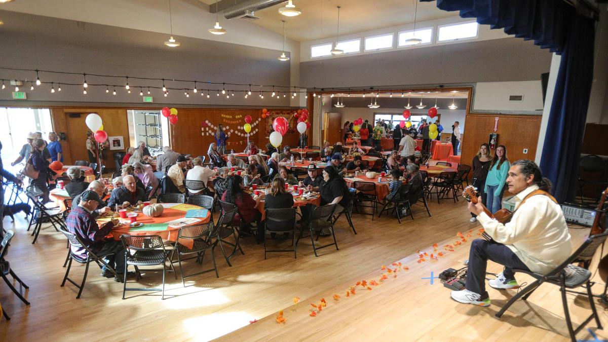 Jon Stephen plays guitar for the crowd. The 41st annual Thanksgiving dinner was hosted by the Pismo Beach Police Officers’ Association on Nov. 27 2024. Over 2,500 dinners were prepared and 60 turkeys were cooked for the meal at the Pismo Beach Veterans Memorial building.
