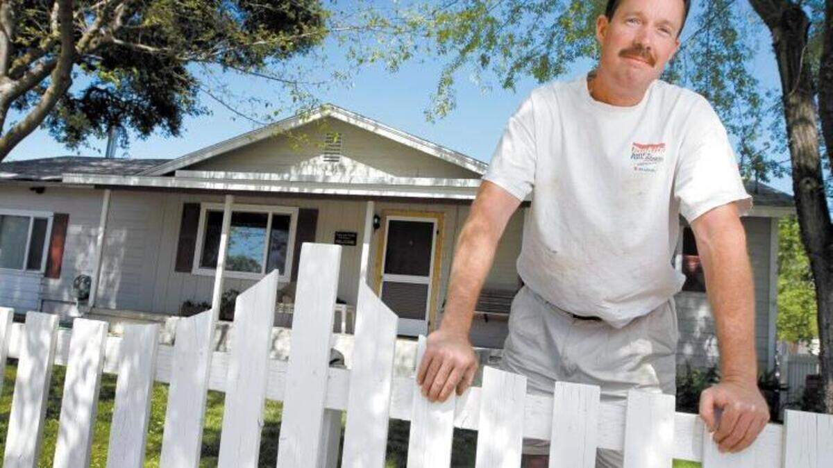 Mike Melvin bought his Atascadero home with 100 percent financing and an adjustable rate mortgage. He is now facing foreclosure and trying to negotiate with his lender. Photo by Joe Johnston 4-16-08