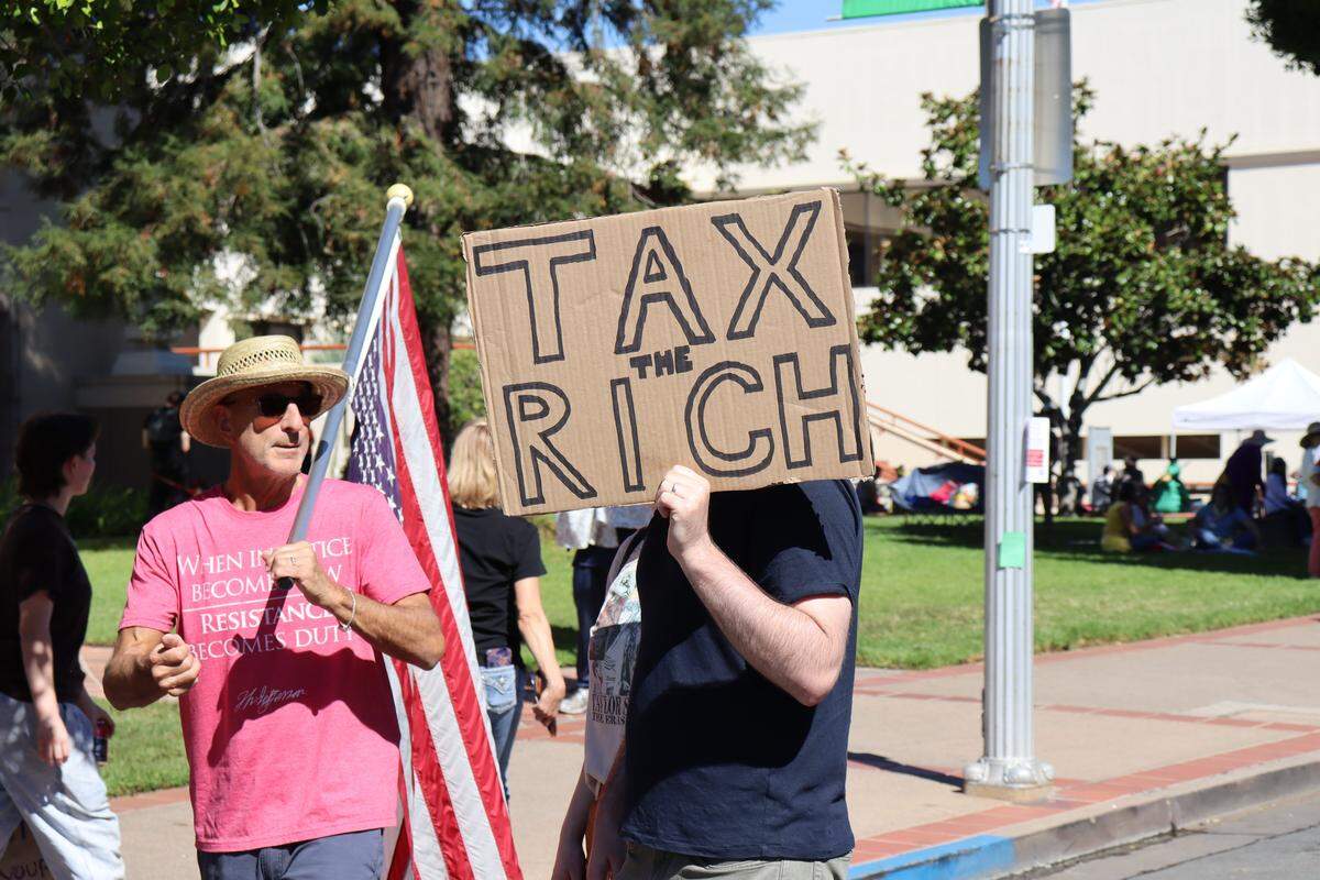 Thousands of people attended the No Kings rally in downtown San Luis Obispo to protest the Trump administration and support Prop. 50 on Oct. 18, 2025.