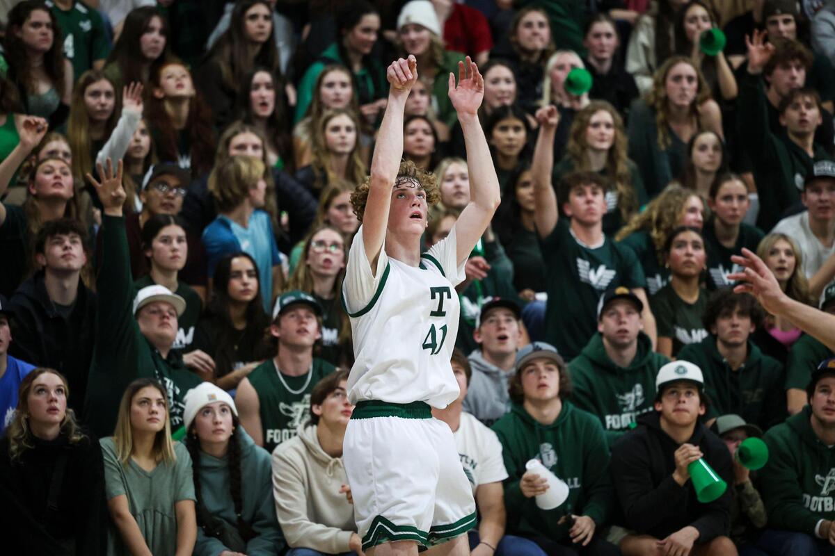Ryan McNamee takes a shot as a packed gym watches. Templeton High School pulled away in the final minutes, beating Atascadero in a boys basketball game on Feb. 6, 2024.