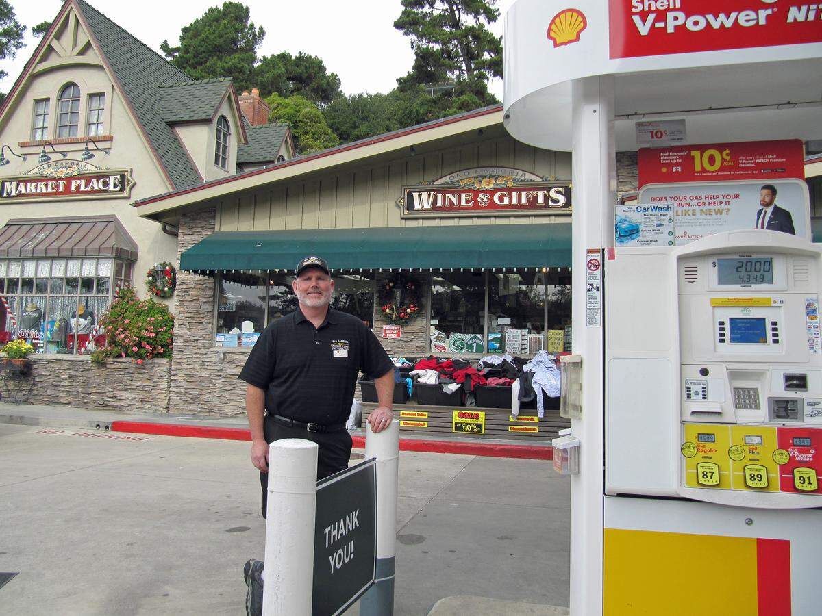 Eric Johnson, manager of Old Cambria Marketplace and Shell Station, reflects on how he restrained a wanted man in the parking area of the service station on Monday.