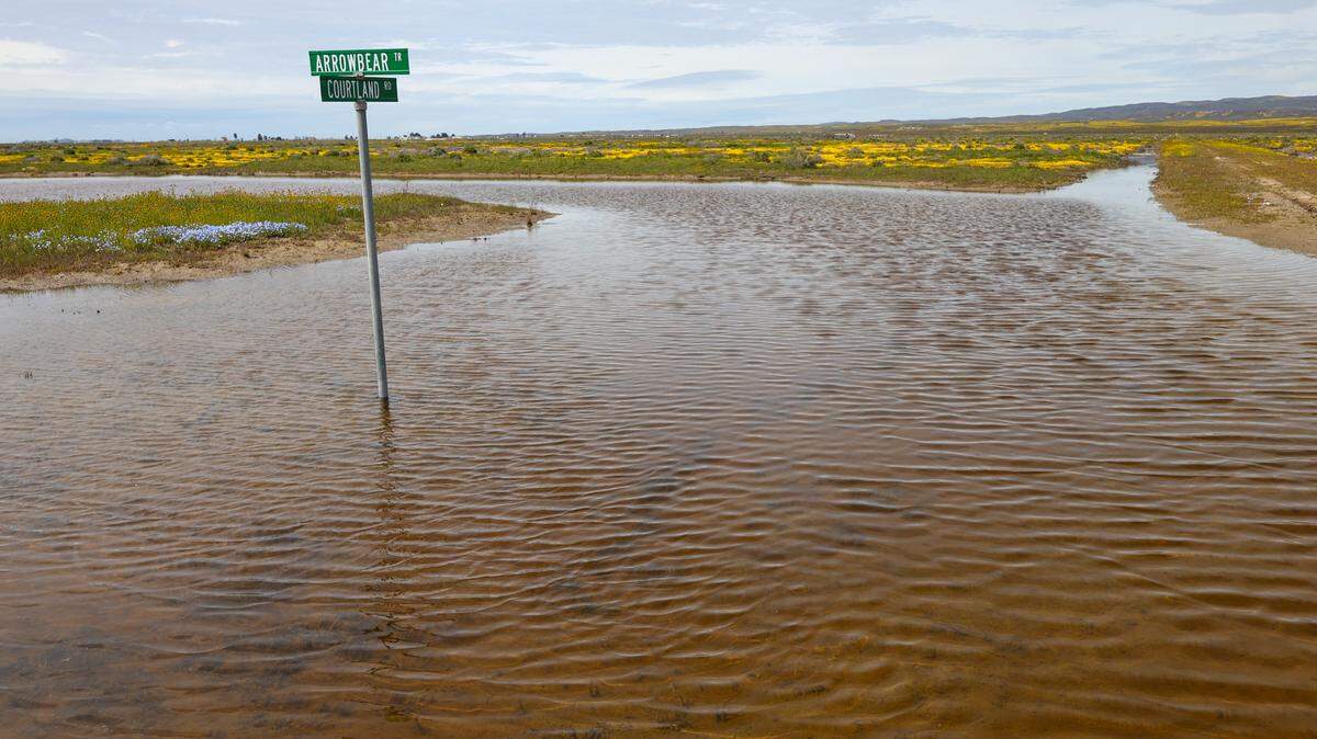 Some of the lesser roads in California Valley are impassable, flooded with water or thick mud.