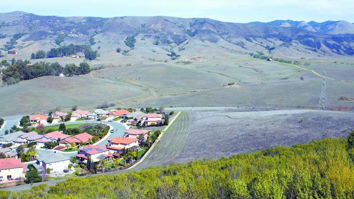 San Luis Obispo residents living on Huckleberry Lane and Spanish Oaks Drive, left, fear the effects of a composting facility proposed for an adjacent parcel.