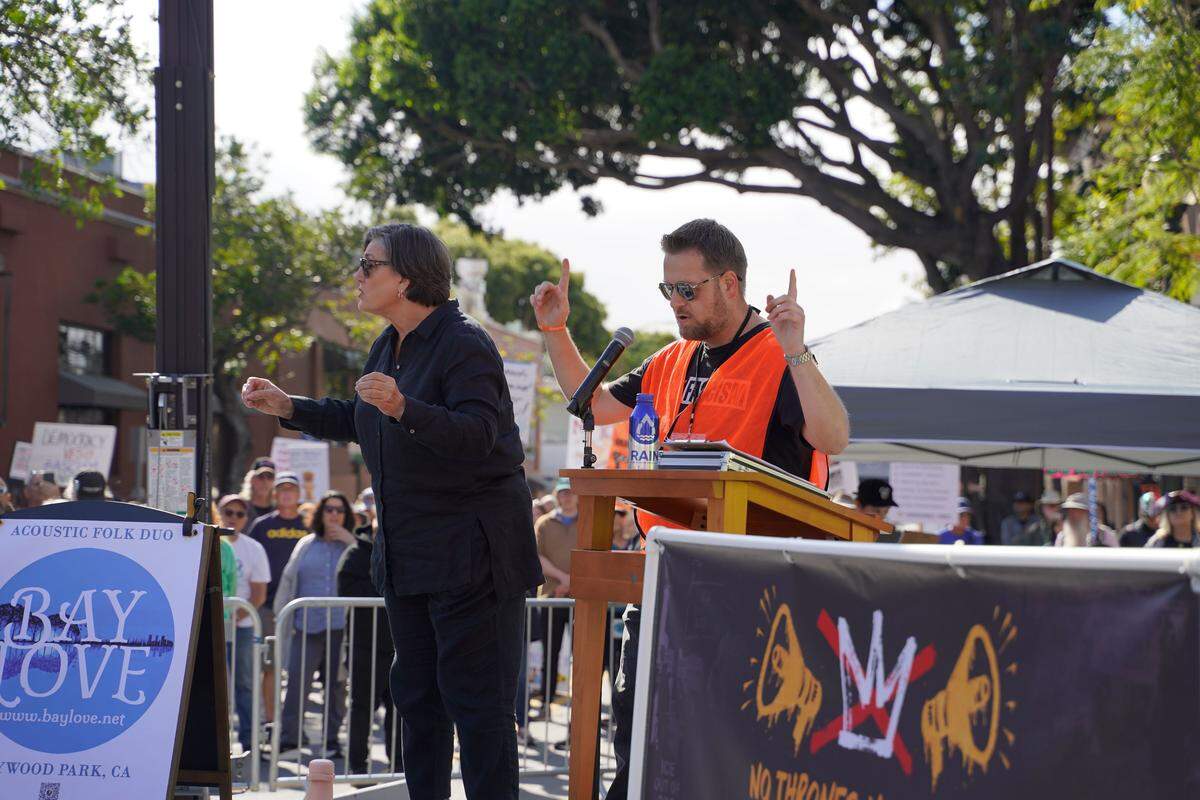 Residents across SLO County rallied downtown at the San Luis Obispo Superior Courthouse for a No Kings protest featuring speakers, music and community groups on March 28, 2026. Speaker Jesse Hudson addresses the crowd.