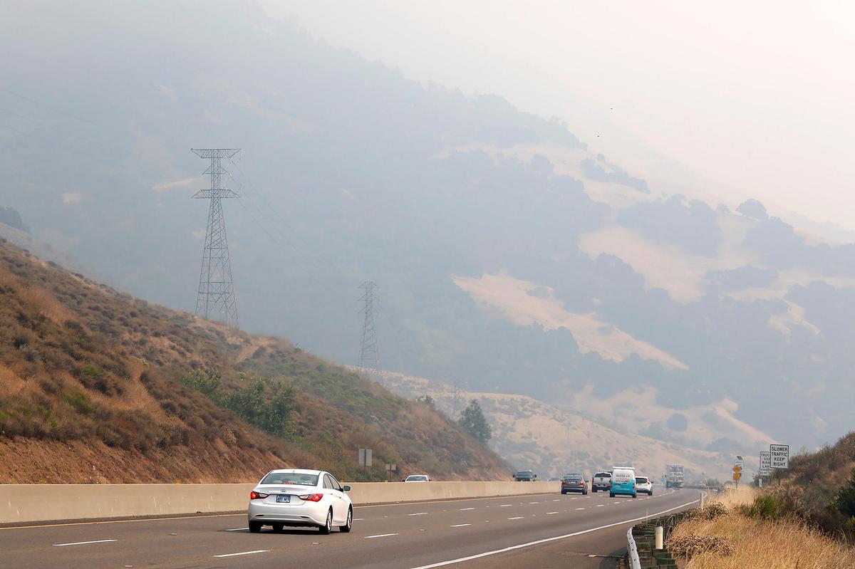 Smoke settles heavily over the Cuesta Grade in San Luis Obispo on Thursday.