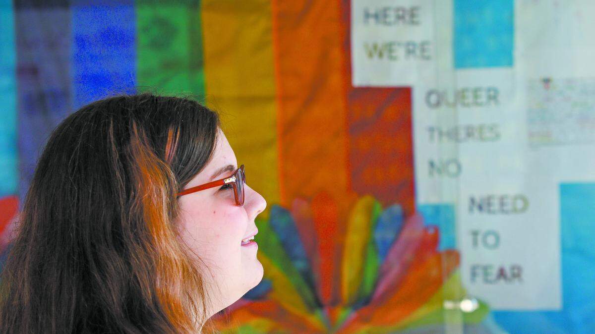 Amanda Calmere, 15, in front of a display she created for the Atascadero High School library on the definition of the word "queer" and efforts in the LGBT community to move the word from a slur to a description of anyone who feels outside societal norms.