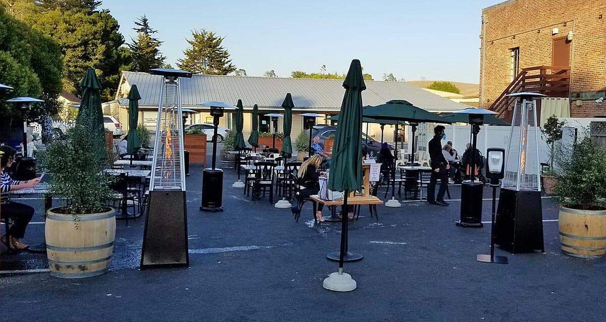 Linn’s Restaurant in Cambria set up tables in its parking lot.