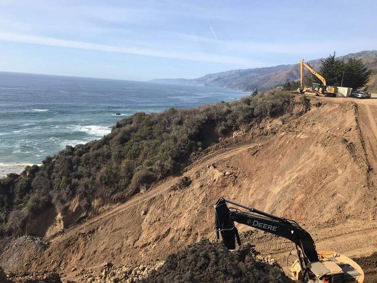 Caltrans crews are building haul roads on the bottom of the canyon at the Rat Creek closure of Highway 1 near Big Sur.