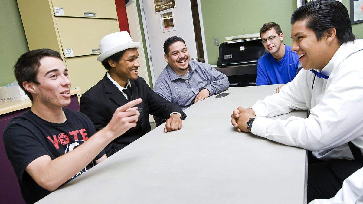 Mario De Leon, center, coordinator of the Keystone Program in Oceano, meets with some of the program’s participants, from left, Andrew Andrade, Modest Keenan, Beau Velten and Lazaro Brito.
