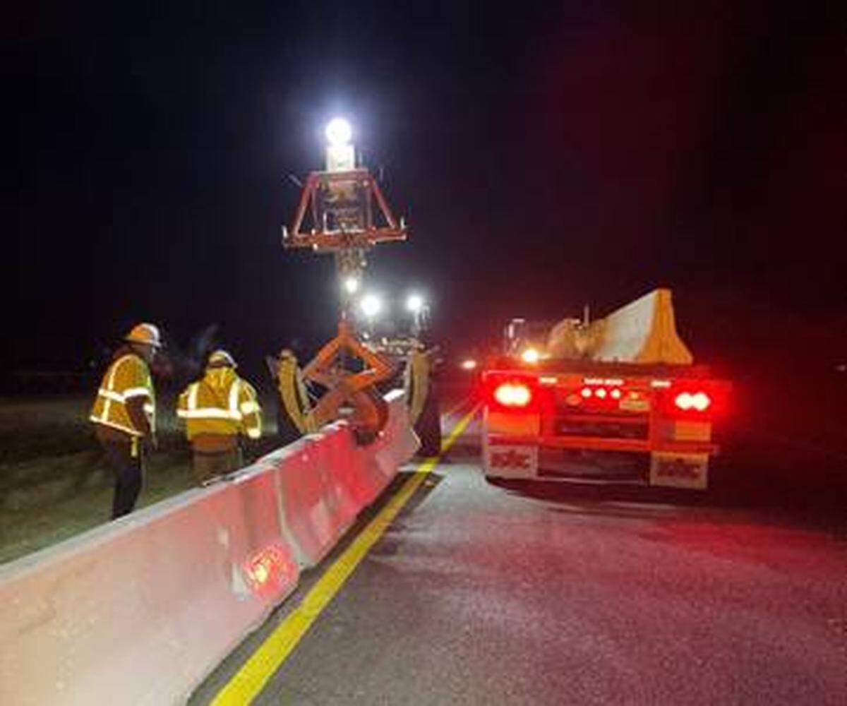 A photo of Caltrans crews installing a protective barrier on Highway 101 near Wellsona Road in Paso Robles.
