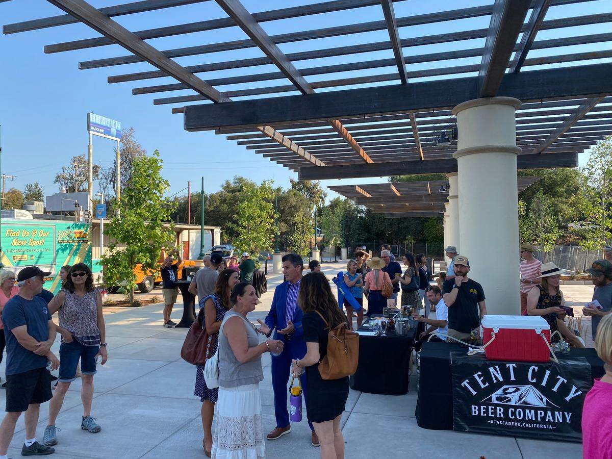 People of all ages gathered to celebrate the plaza’s opening, while local restaurants served food, drinks and dessert.
