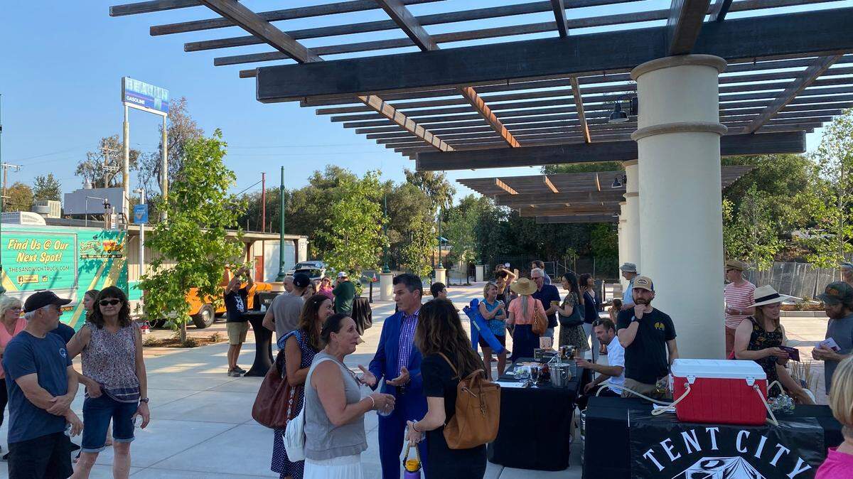 People of all ages gathered to celebrate the plaza’s opening, while local restaurants served food, drinks and dessert.