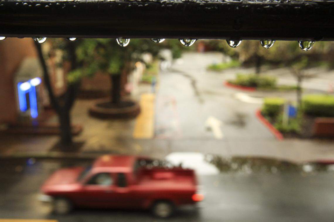 Rain drips from a cable at the Marsh St. parking garage. A late season storm soaked San Luis Obispo County on April 21, 2026.