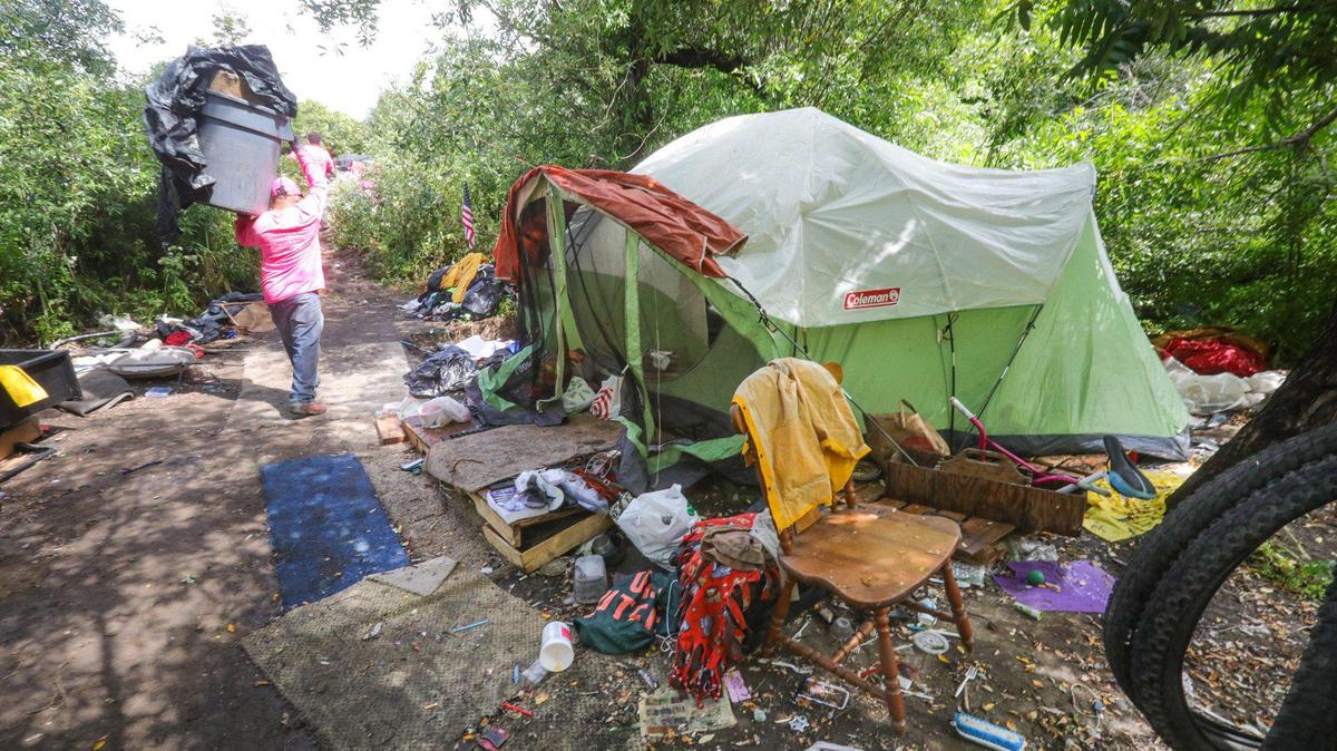 A homeless camp was dismantled along San Luis Obispo Creek near Prado Road on Monday.