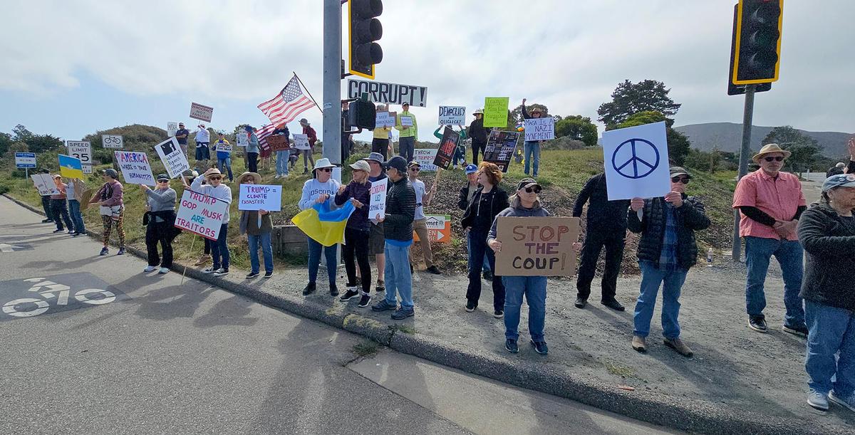 Hundreds of people gathered at each corner of the intersection at Los Osos Valley Road and South Bay Boulevard to protest the current administration on Saturday, Mar. 1, 2025.