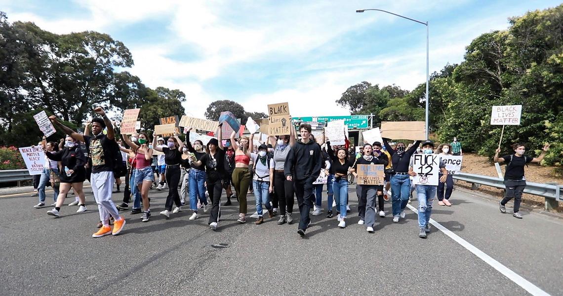 Black Lives Matter protesters march on Highway 101, stopping traffic on June 1, 2020.