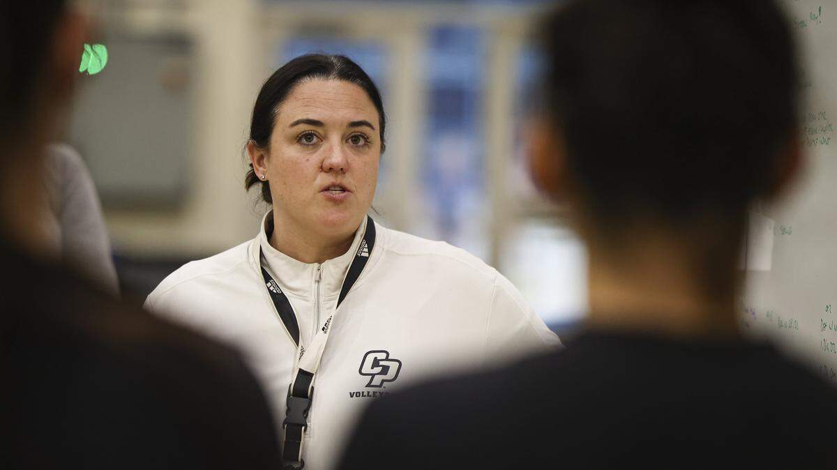 Cal Poly women's volleyball head coach Caroline Walters leads practice on Dec. 8, 2025.