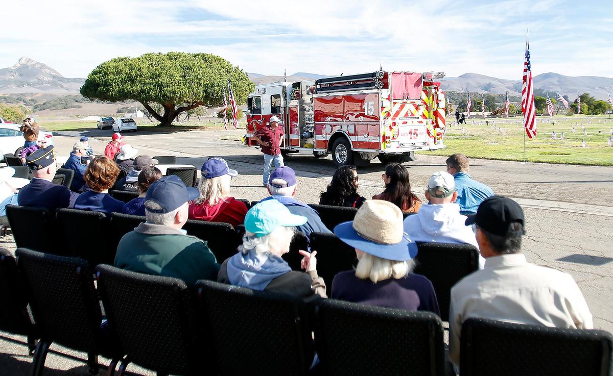A Veterans Day celebration was held at the Los Osos Valley Memorial Park, Friday, Nov. 11, 2022. Attendees watched Cal Fire trucks drive by. (Laura Dickinson, The Tribune San Luis Obispo)