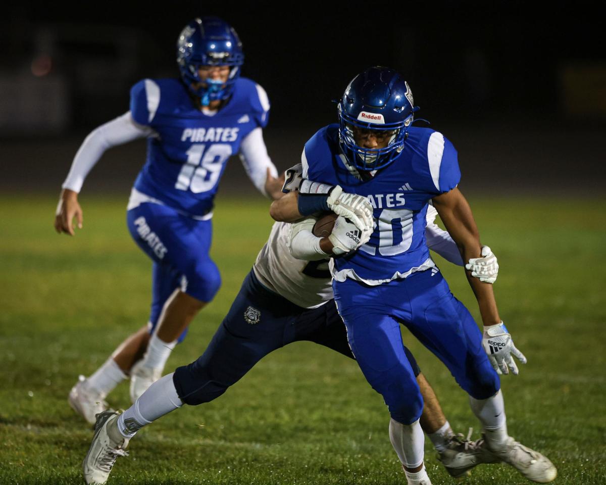 Jayden Johnson runs for Pirates. Morro Bay beat Golden Valley of Bakersfield 40-14 on Sept. 13, 2024.