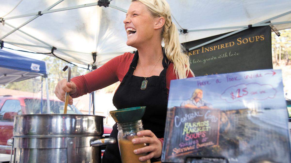 Stephanie Burchiel, author of ‘Central Coast Farmers Market Soups,’ serves it up at the Cambria Farmers Market.