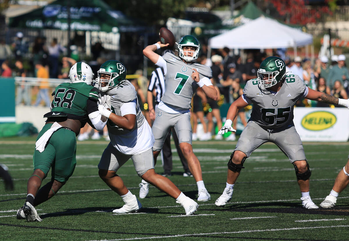 Mustang quarterback Ty Diffenbach gets protection from Lief Magnuson and Charlie Adams. Cal Poly fell to Portland State 40-35 in a college football game at Mustang Memorial Field on Nov. 1, 2025.