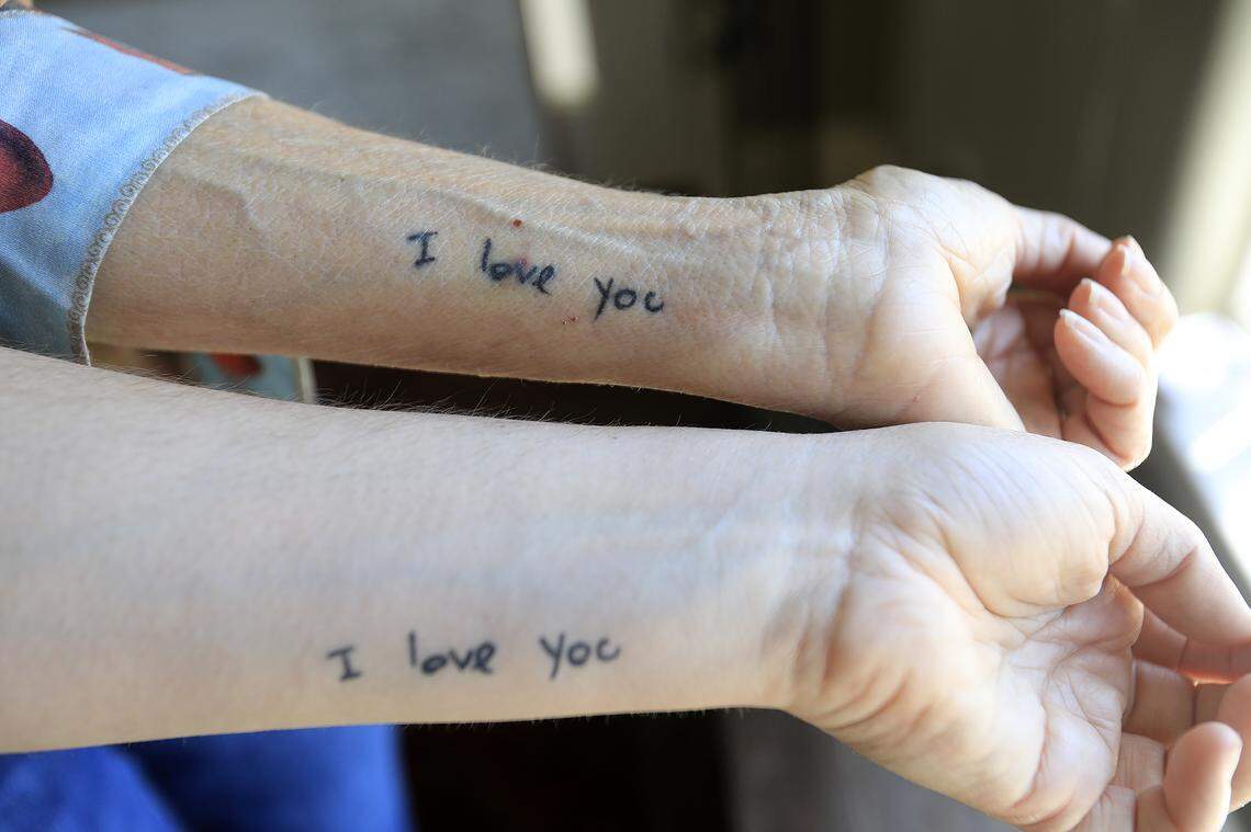 Lauri Strain and daughter Summer, got similar tatoos taken from son’s Ian suicide note. Strain has started a nonprofit, HOPE With IAN, to spread awareness and education about suicide and mental health. 