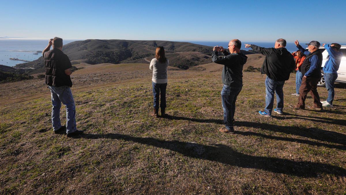 A tour led by HomeFed representatives takes in the view. The Wild Cherry Canyon property is a 2,400 acre ranch in the hills above Avila Beach and Port San Luis at the left.